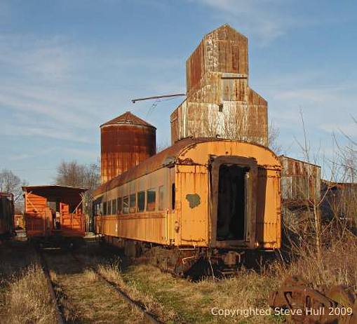 Old grain elevator and railroad cars in Carthage Indiana